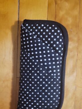 Quilted polka dot soft case in black.